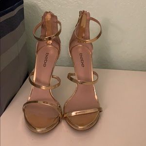BEBE GOLD THREE STRAPPED HEELS